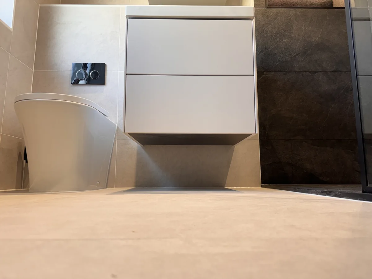 Floating vanity and concealed-cistern toilet